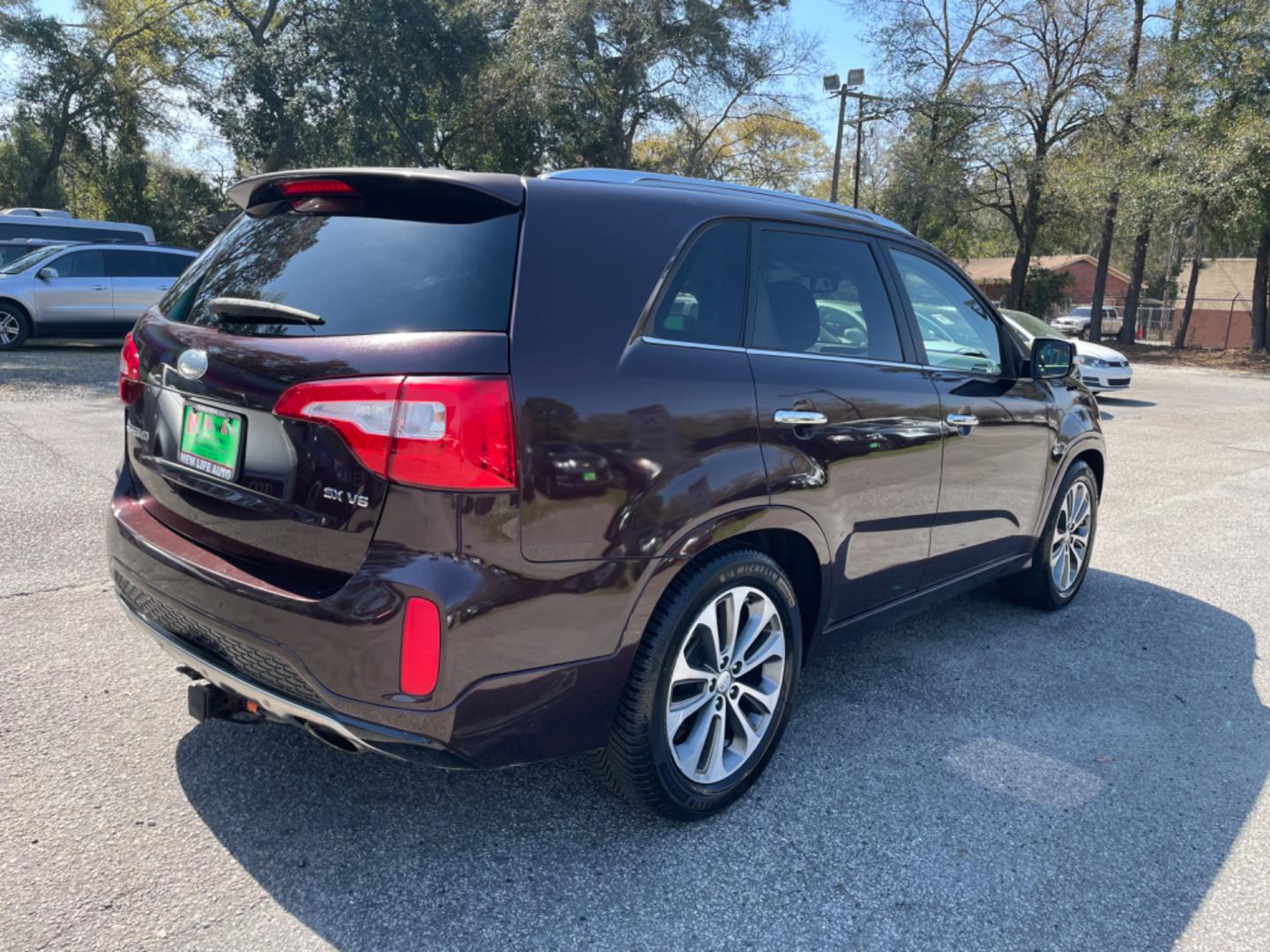 2015 PLUM KIA SORENTO SX (5XYKW4A77FG) with an 3.3L engine, Automatic transmission, located at 5103 Dorchester Rd., Charleston, SC, 29418-5607, (843) 767-1122, 36.245171, -115.228050 - Local Trade-in with Leather, Panoramic Sunroof, Navigation, Backup Camera, CD/AUX/Sat/Bluetooth, Dual Climate Control, Power Everything (windows, locks, seats, mirrors), Heated/Cooled/Memory Seating, Power Liftgate, Convenient Third Row, Push Button Start, Keyless Entry, Alloy Wheels. Certified One - Photo#6